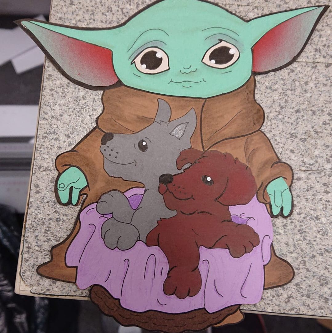 Baby-Yoda / Grogu mit Hundewelpen